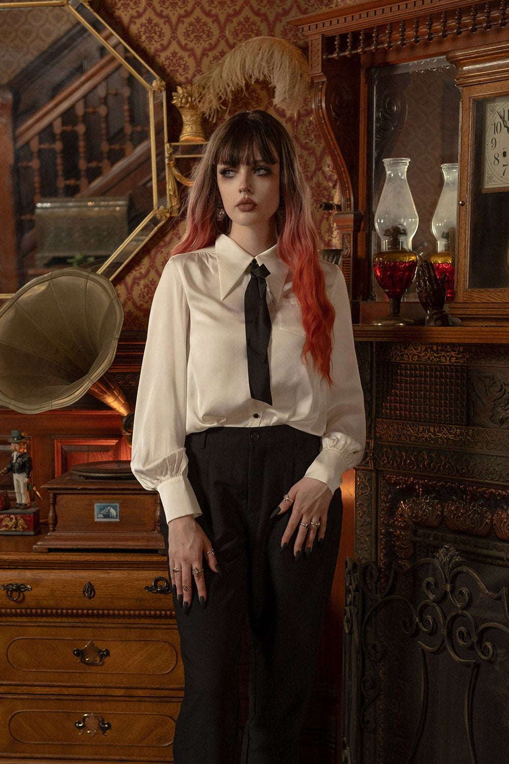 white satin pointed vampire collar blouse by lively ghosts  with black buttons 