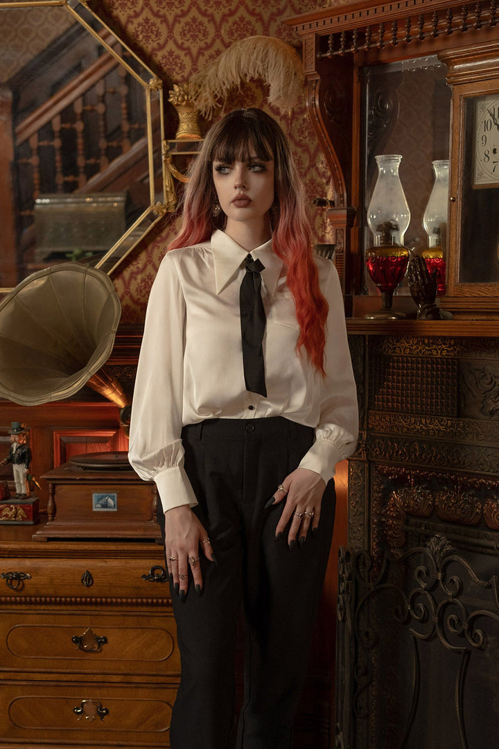 white satin pointed vampire collar blouse by lively ghosts  with black buttons 