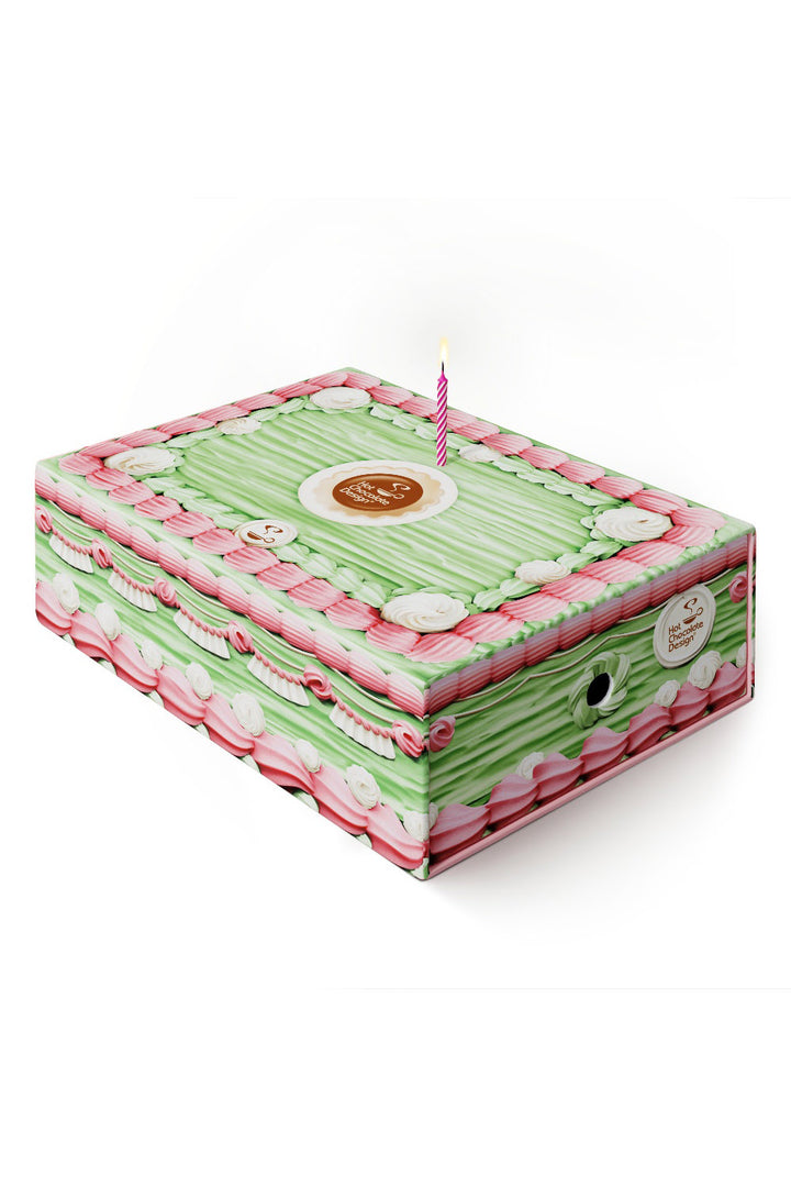 lace rimmed striped steampunk high heels in a cake box