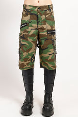 Camouflage shorts with black boots on a white background