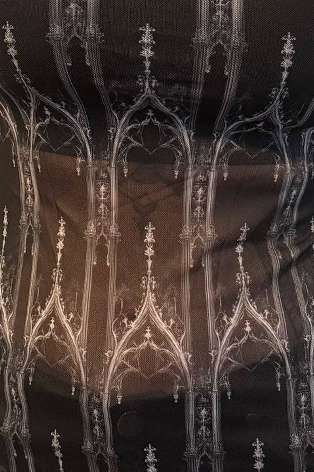 Mesh fabric top with cathedral design