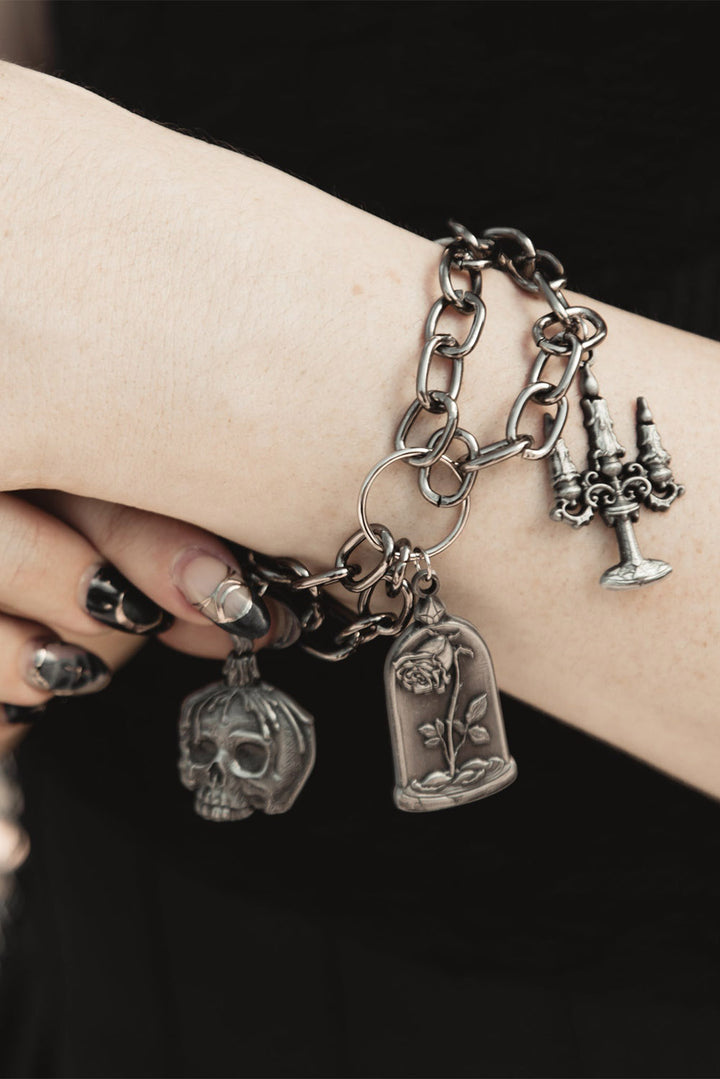dark academia bracelet with occult charms 