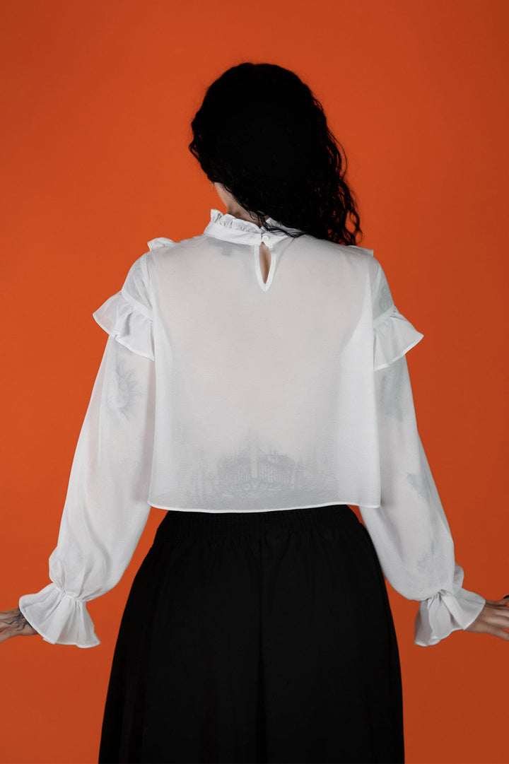 white victorian ruffle top by lively ghosts