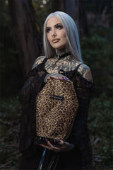 leopard print coffin-shaped backpack