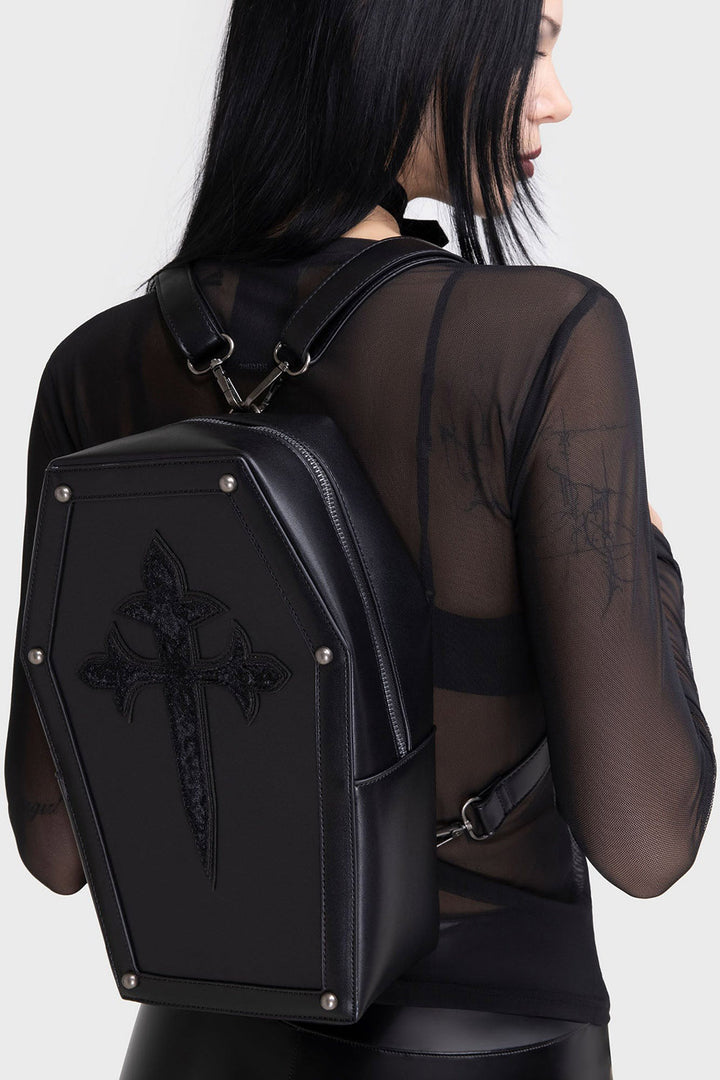 black casket shaped backpack