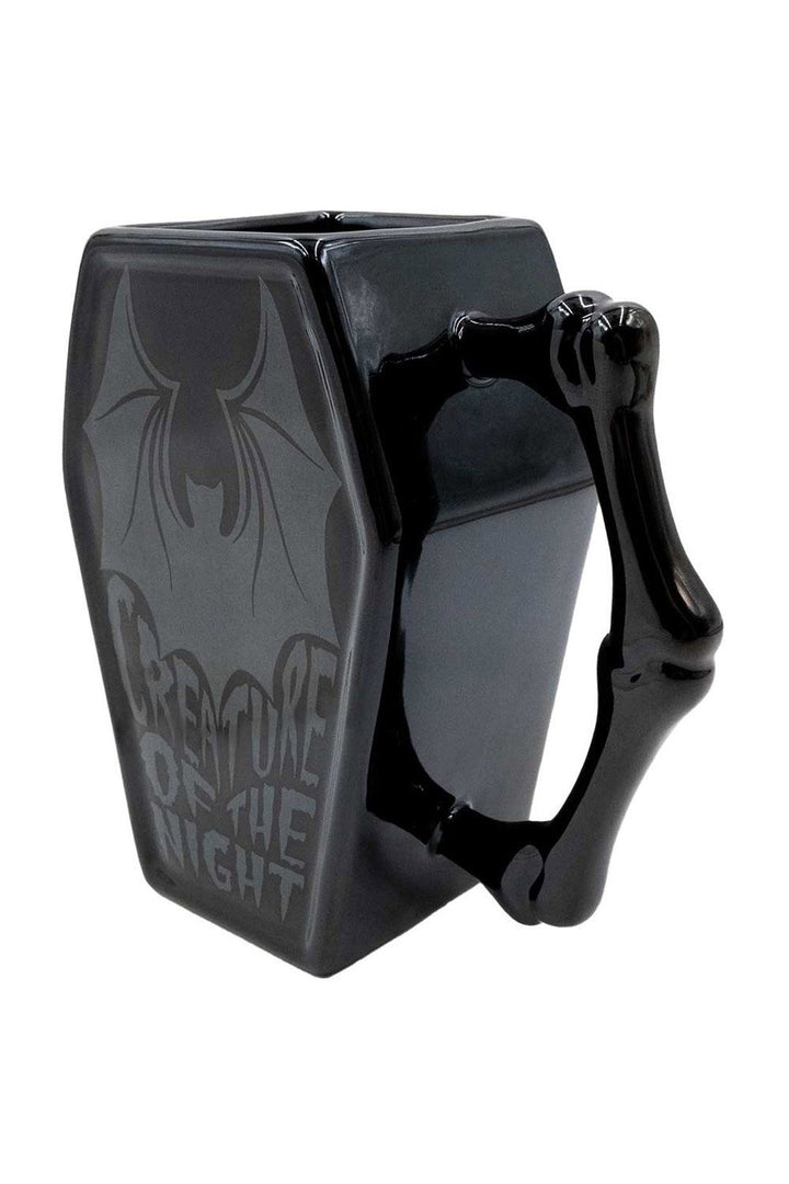 coffin-shaped mug with bone handle