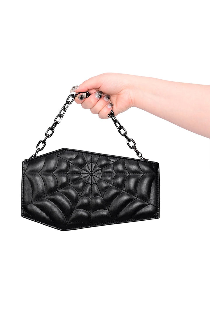 black coffin purse with spiderweb pattern