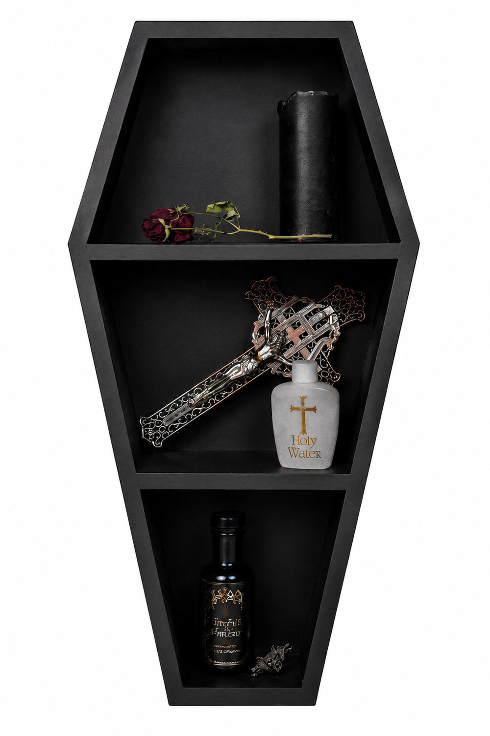 Black coffin-shaped shelf with decorative items including a bottle, cross, and rose.
