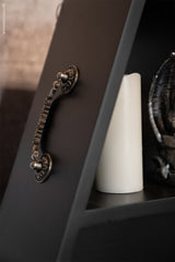 large coffin shelf with gothic hardware 