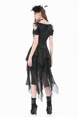 Back view of model wearing cut out shoulder black top