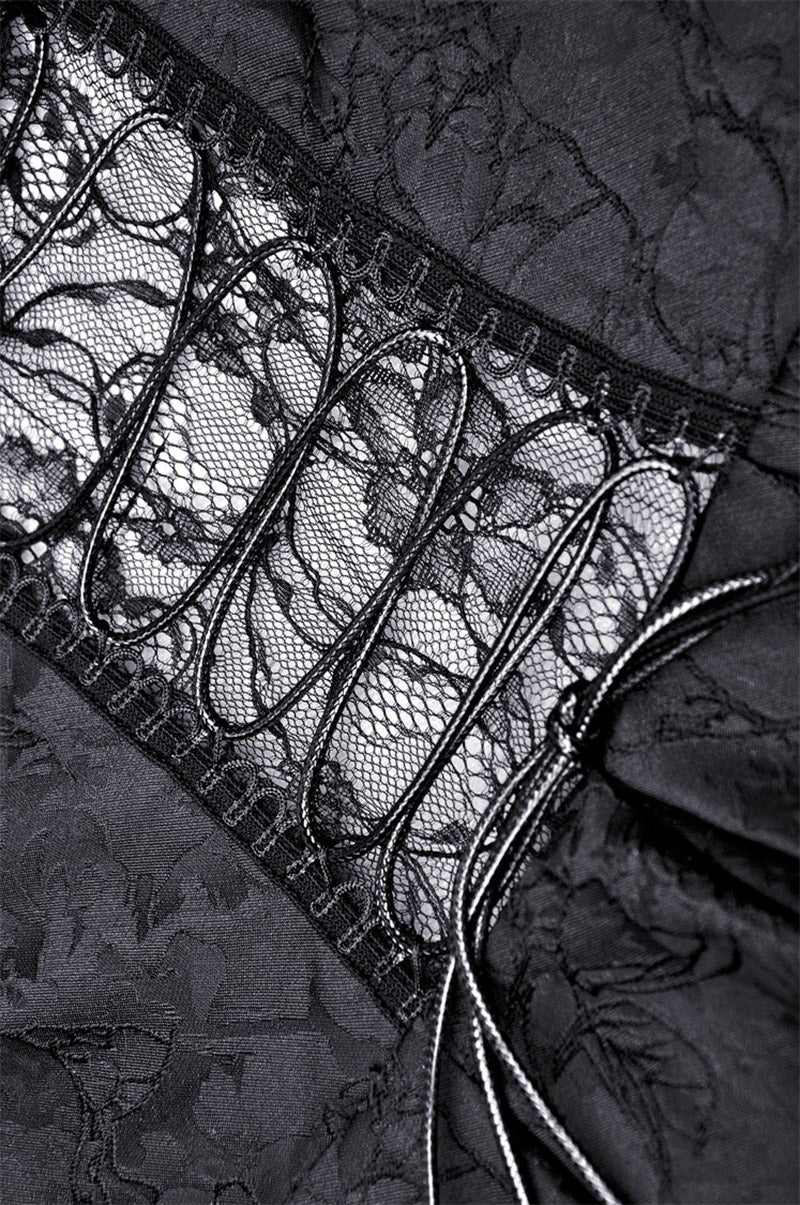 Close-up of black lace fabric with a satin border