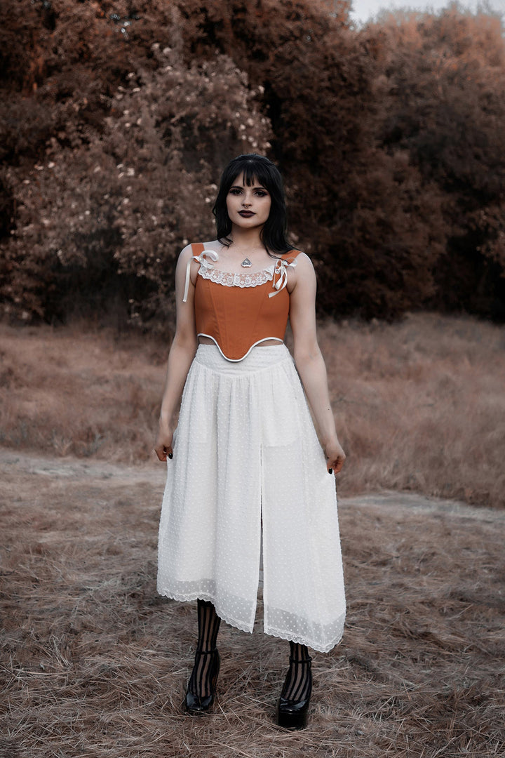 white and brown corset top