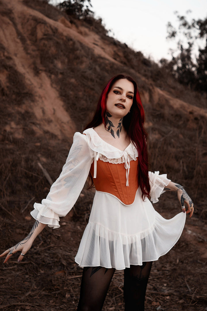 lively ghosts lace-up brown corset top on a white dress
