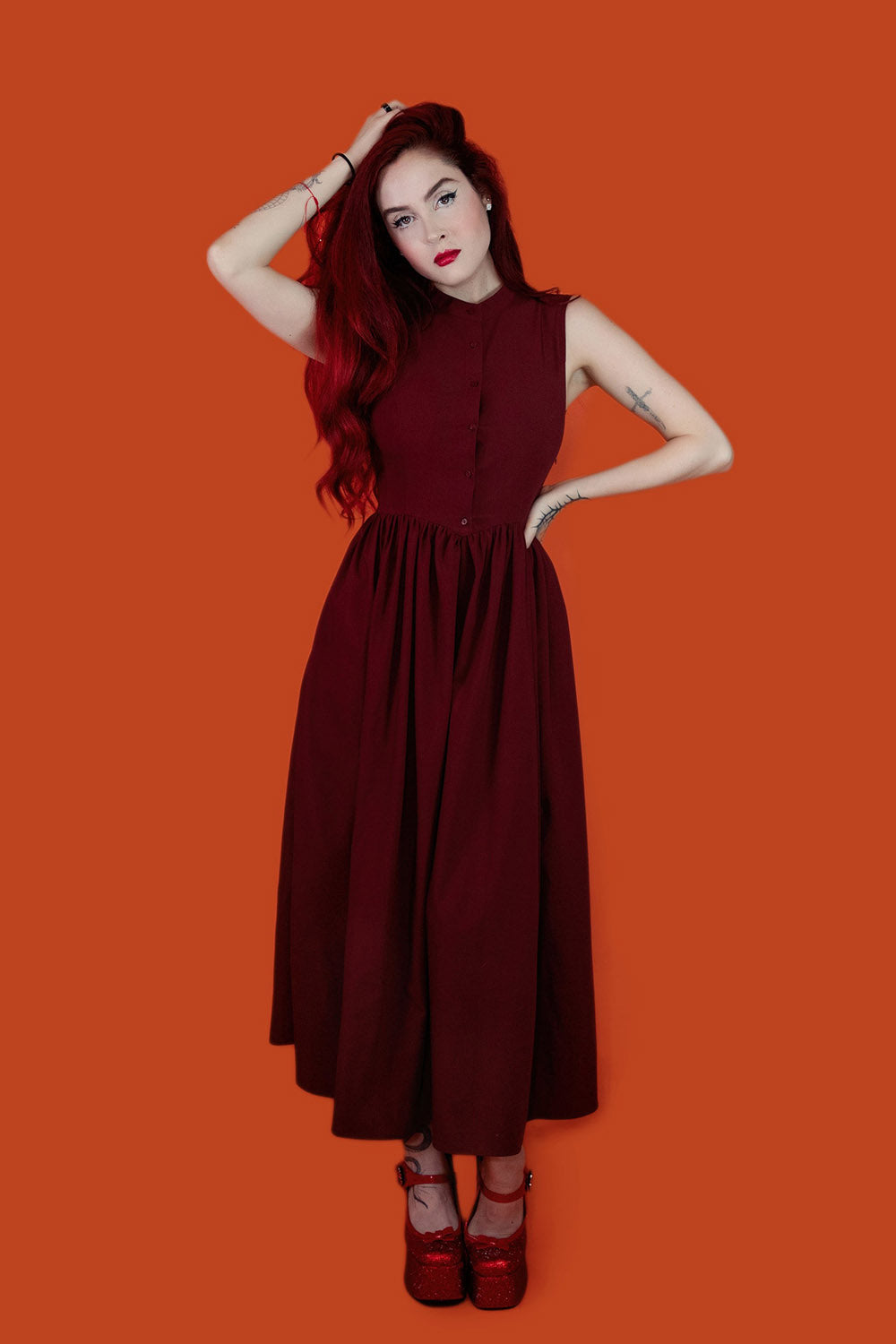 buttoned red sleeveless dress with pockets