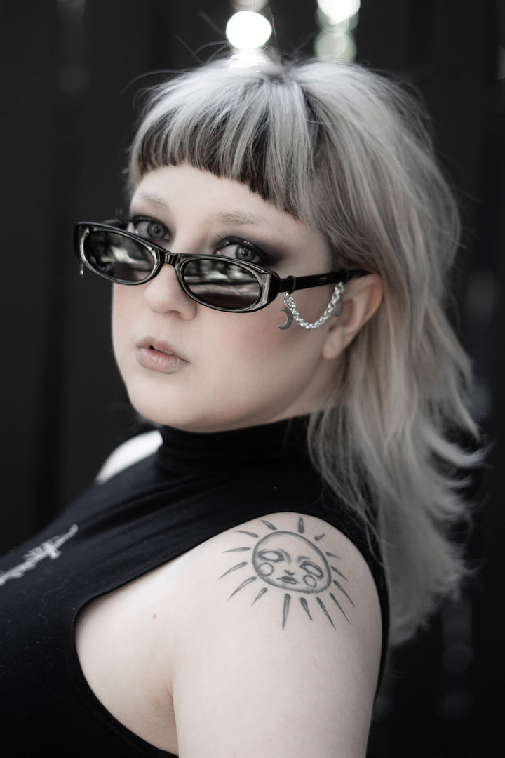 punk thin oval black sunglasses with crescent moon charms 