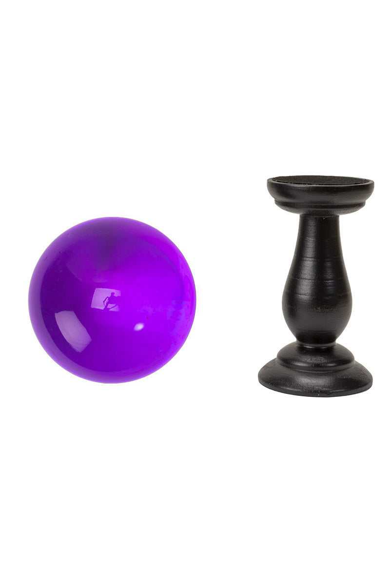 fortune teller purple crystal ball with a black stand 