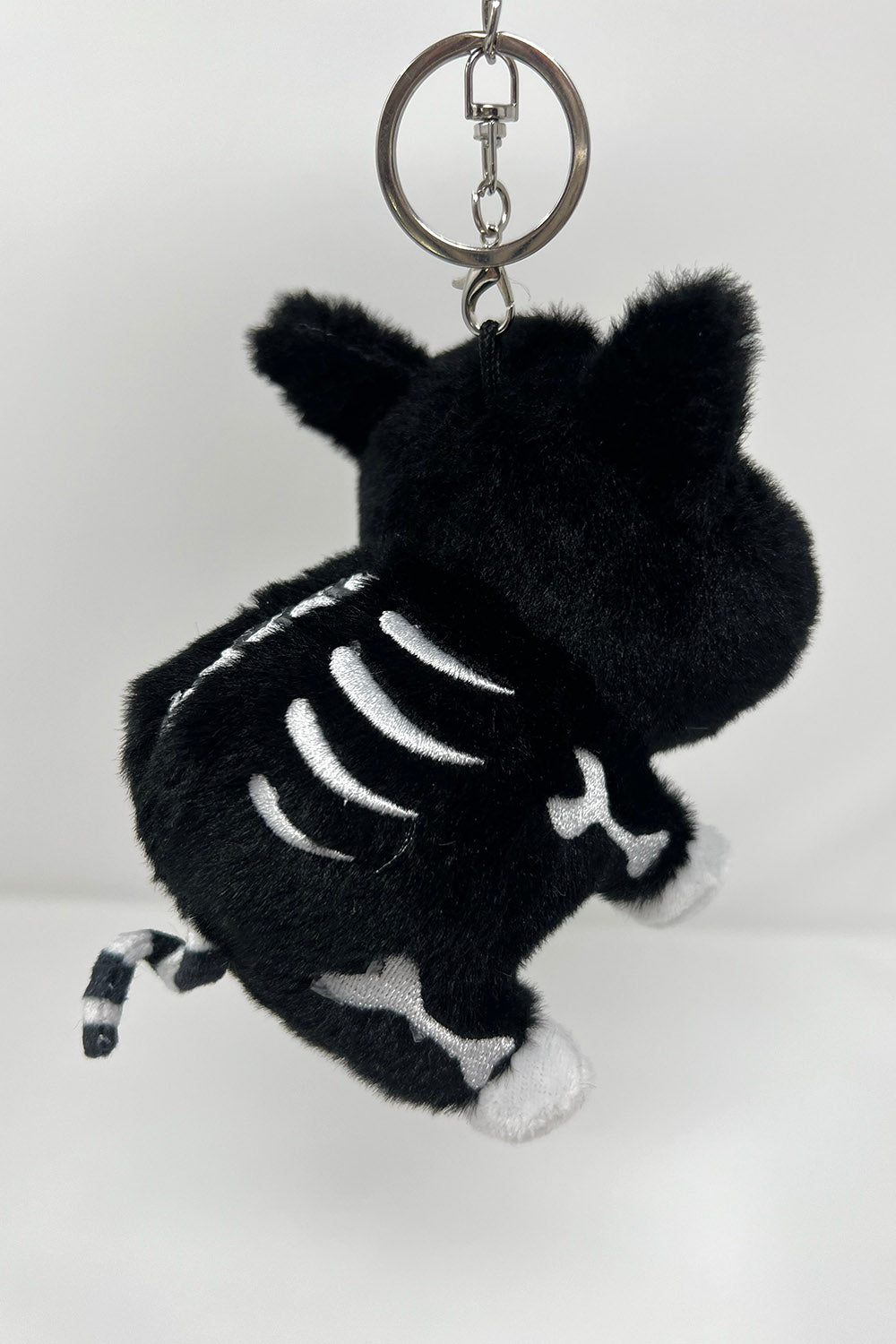 stuffed creepy cute embroidered skeleton pig keychain