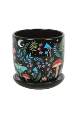 Cute black plant pot with mushrooms and ferns