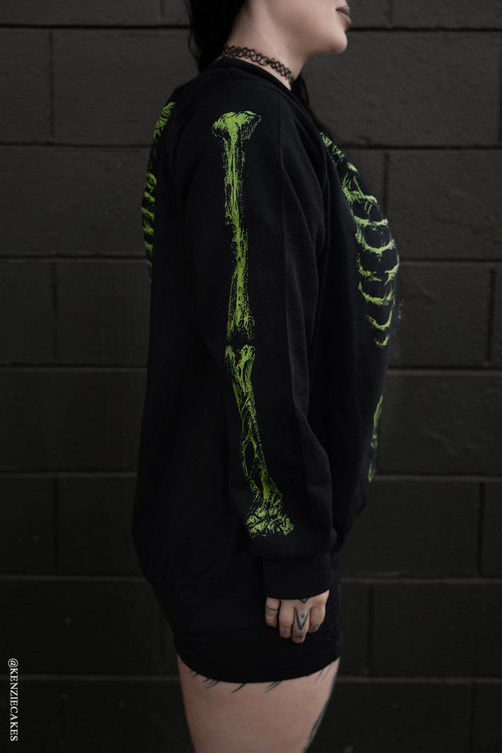 bone sleeve horror sweater