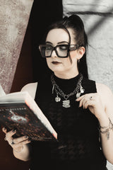 metal dark academia  chain necklace with book, moth, teacup, and other vintage inspired charms by the pretty cult