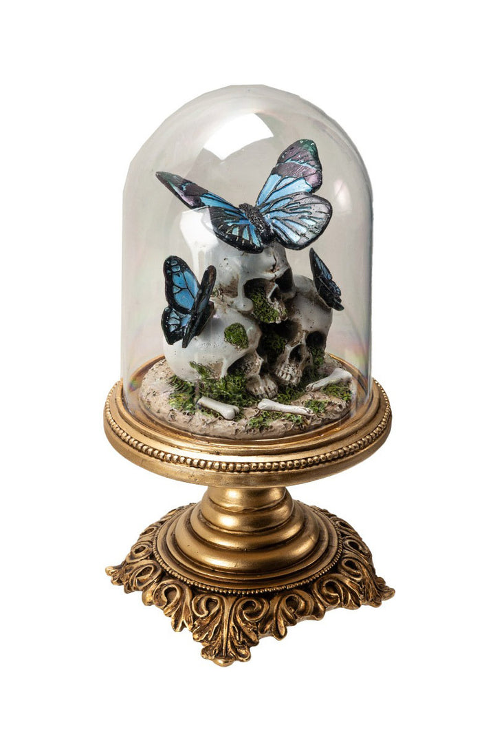 blue butterflies and skulls on an ornate gold gothic stand 