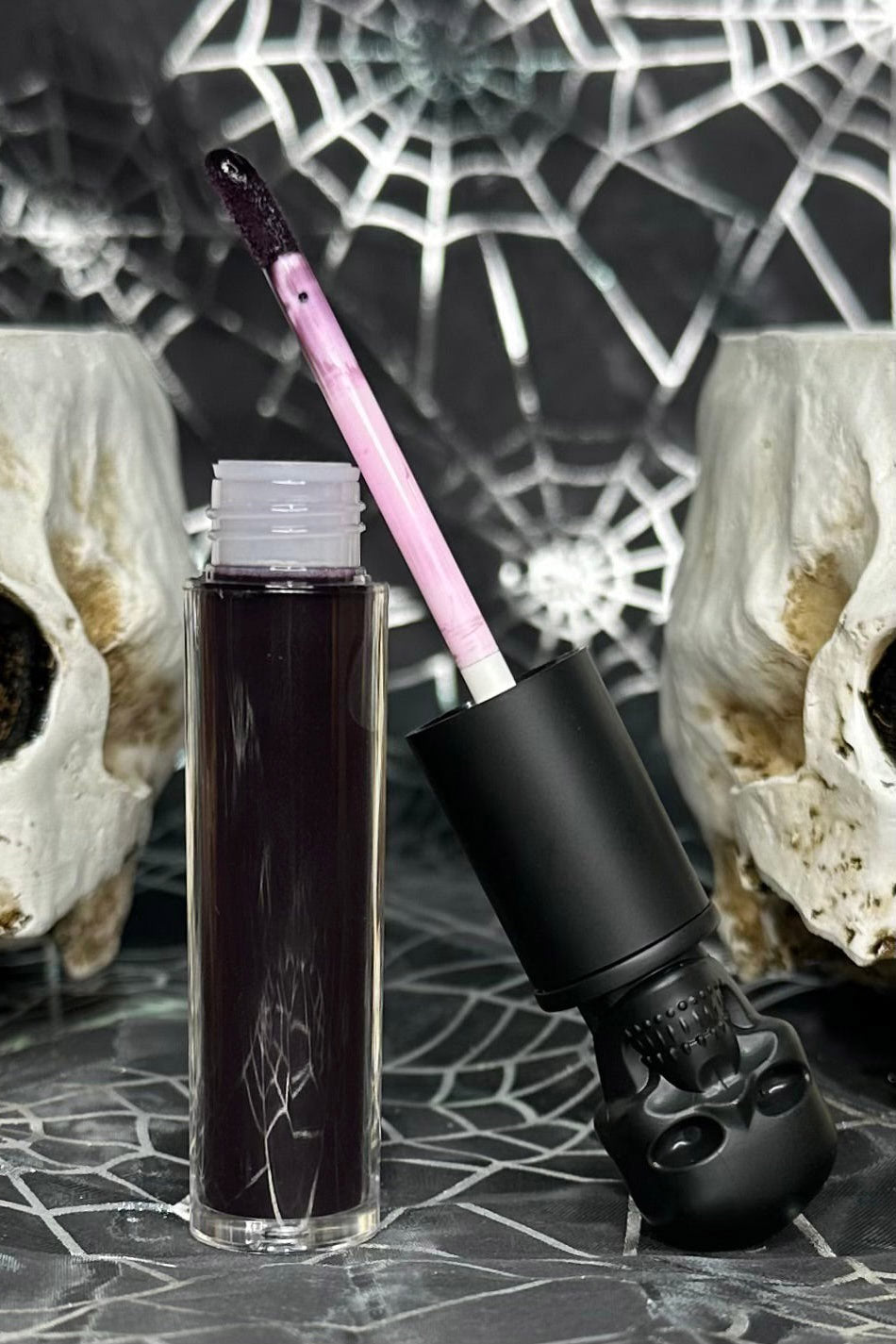 dark purple lipgloss