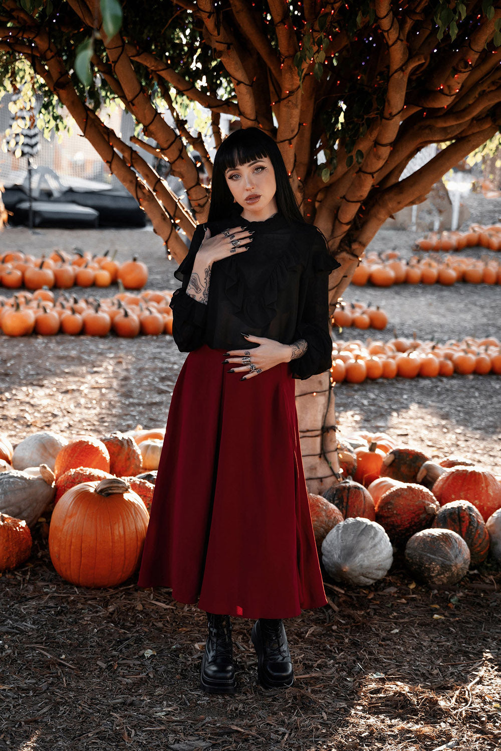 high-waisted dark red skirt
