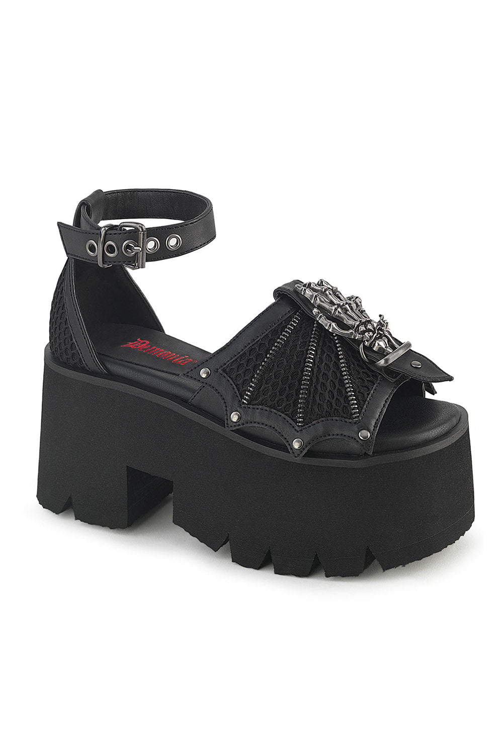 Black platform sandal with decorative straps on a white background