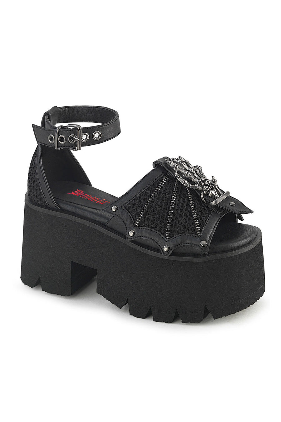 Black platform sandal with decorative straps on a white background