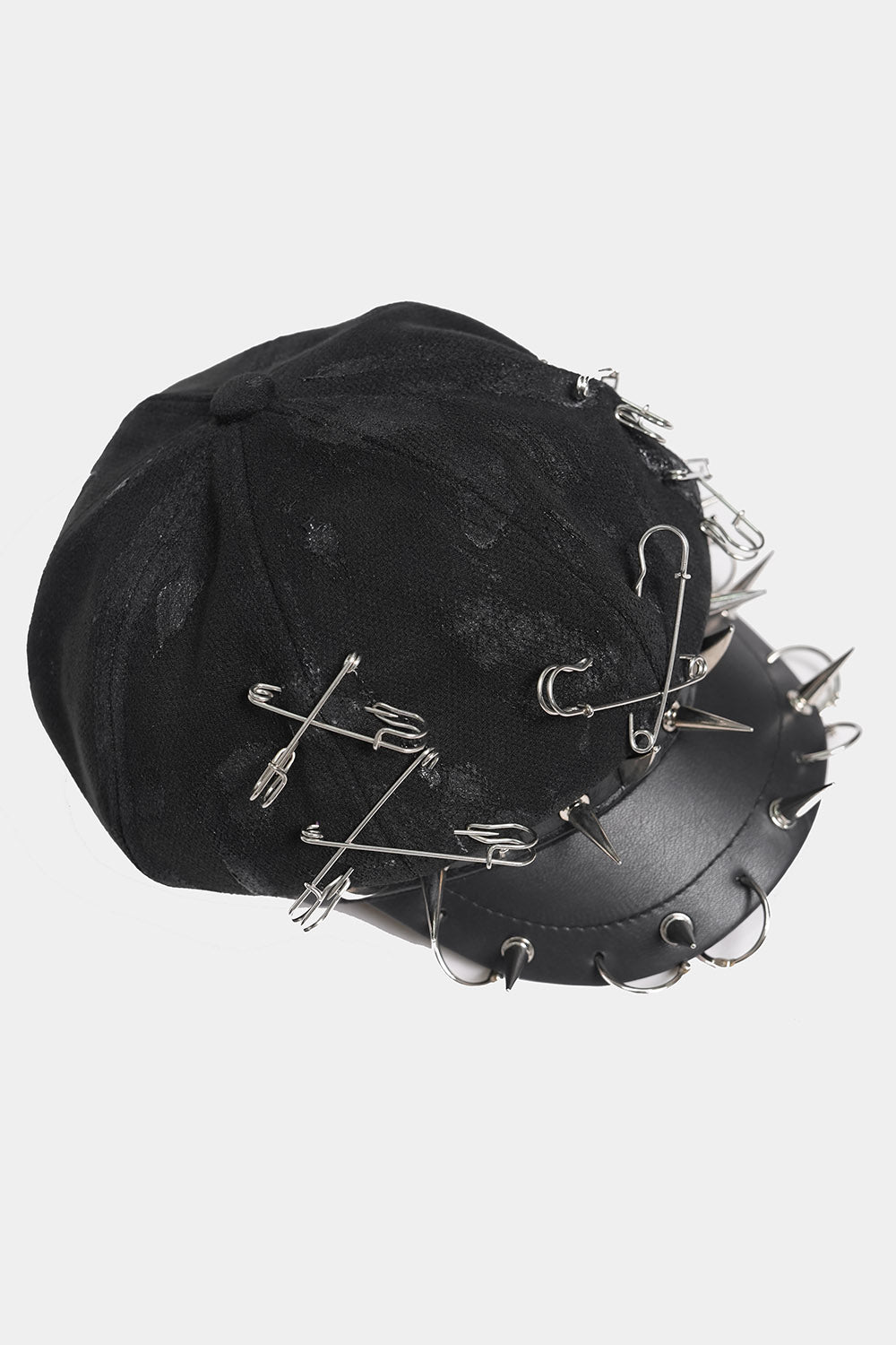 studded safety pin spiked vegan leather cap hat
