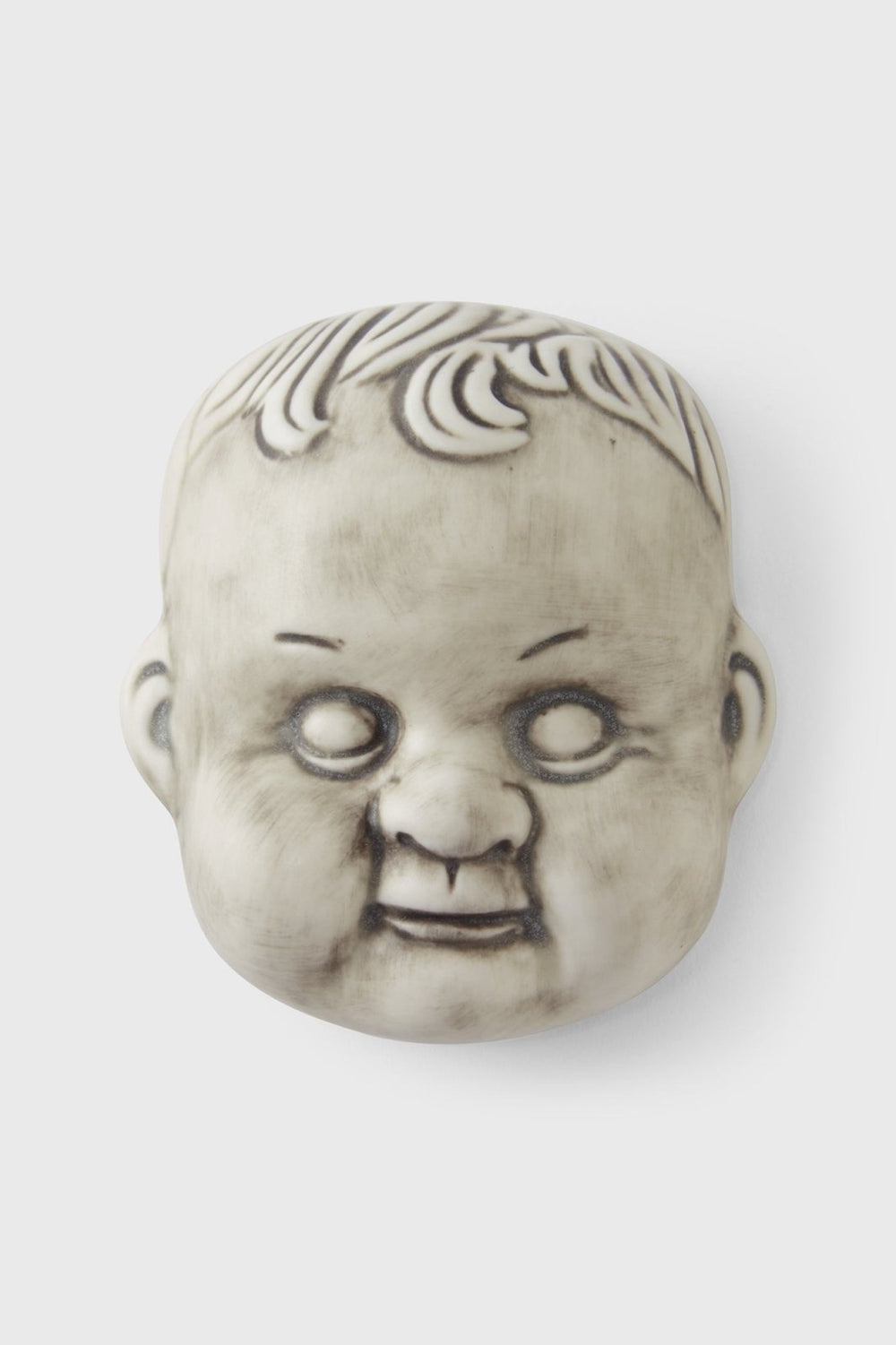 Dolls Head Magnet