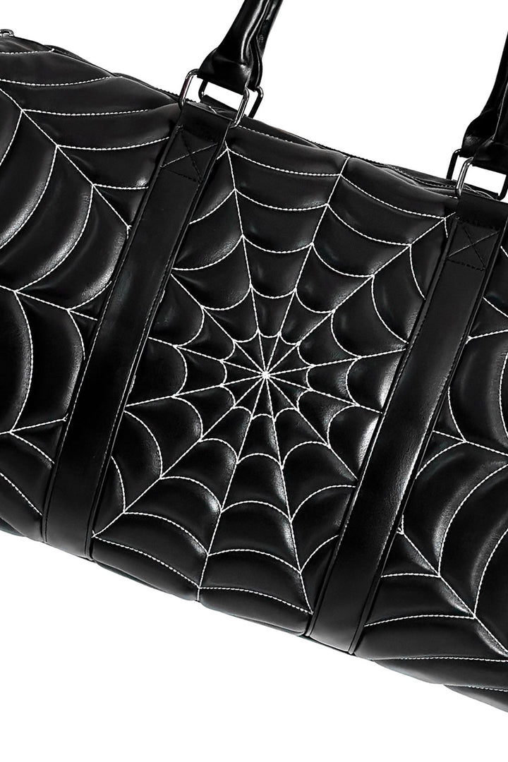 embroidered spiderweb duffel bag