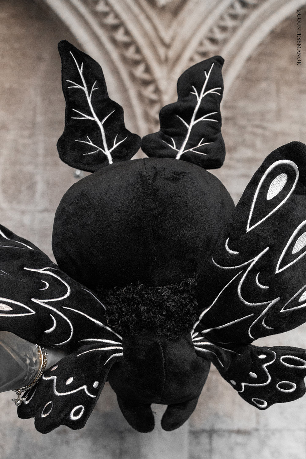 big black and white mothman stuffed animal 