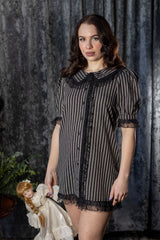 Vintage inspired gothic striped dress with ruffled edges for punk rock fashion emo style and dark academia outfits