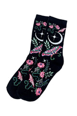 Black socks with floral and moon designs on a white background