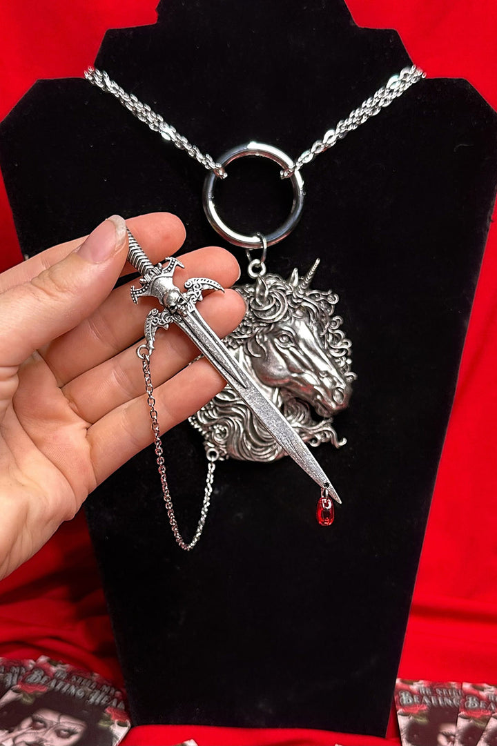 renaissance fair necklace with removable sword