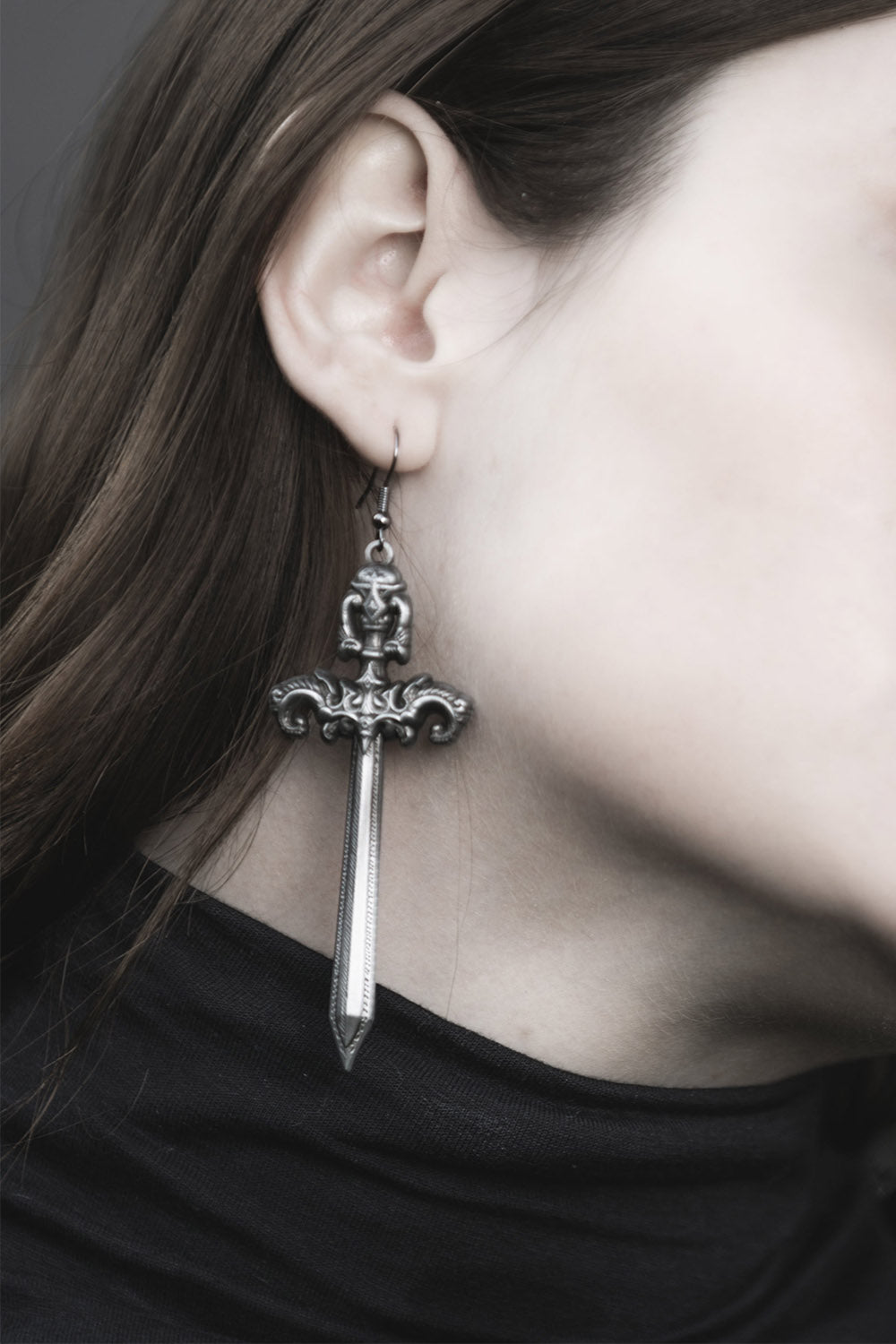 goth silver sword earrings by the pretty cult 