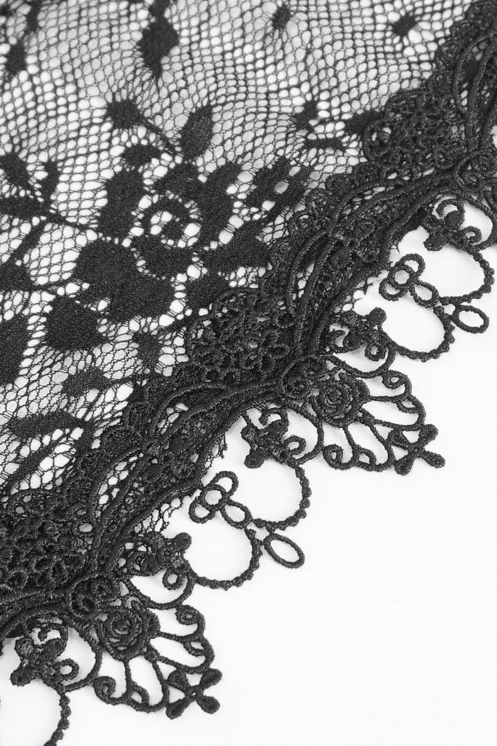 black lace and embroidery on cape
