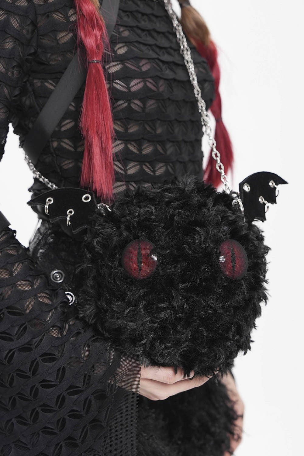 scary monster purse with big red eyes