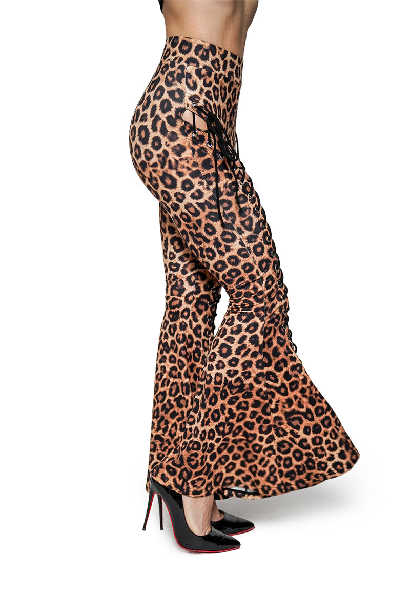 Leopard print bell-bottom pants worn by a person on a white background
