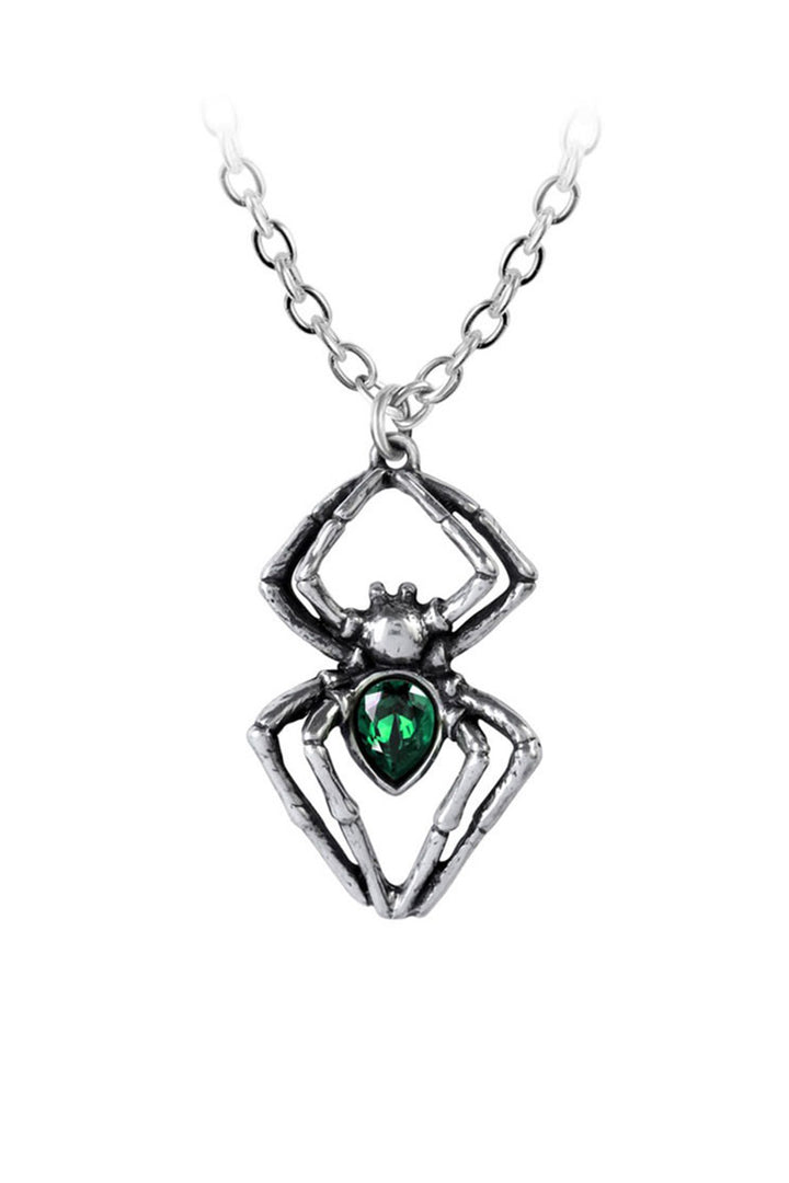 Spider-shaped pendant with a green gemstone on a white background