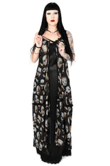 Model wearing Foxblood broken doll dress