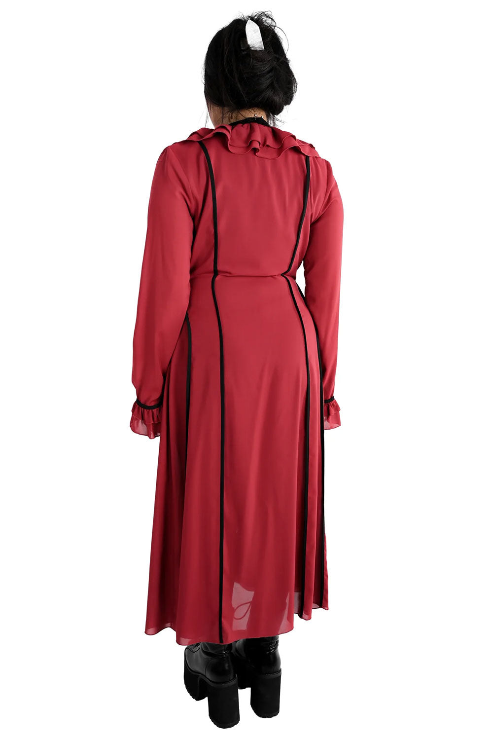 back view of model wearing burgundy Lisa duster from Foxblood with black piping