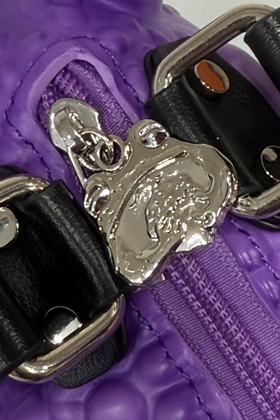 purple toad handbag with toad charm