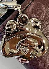 toad charm on toad wallet