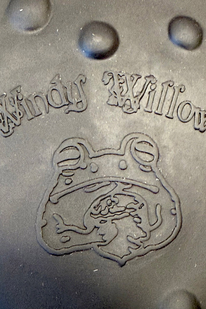 gothic toad purse with frog branding 