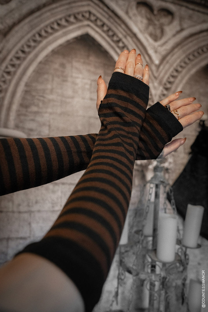 brown and black striped arm warmers