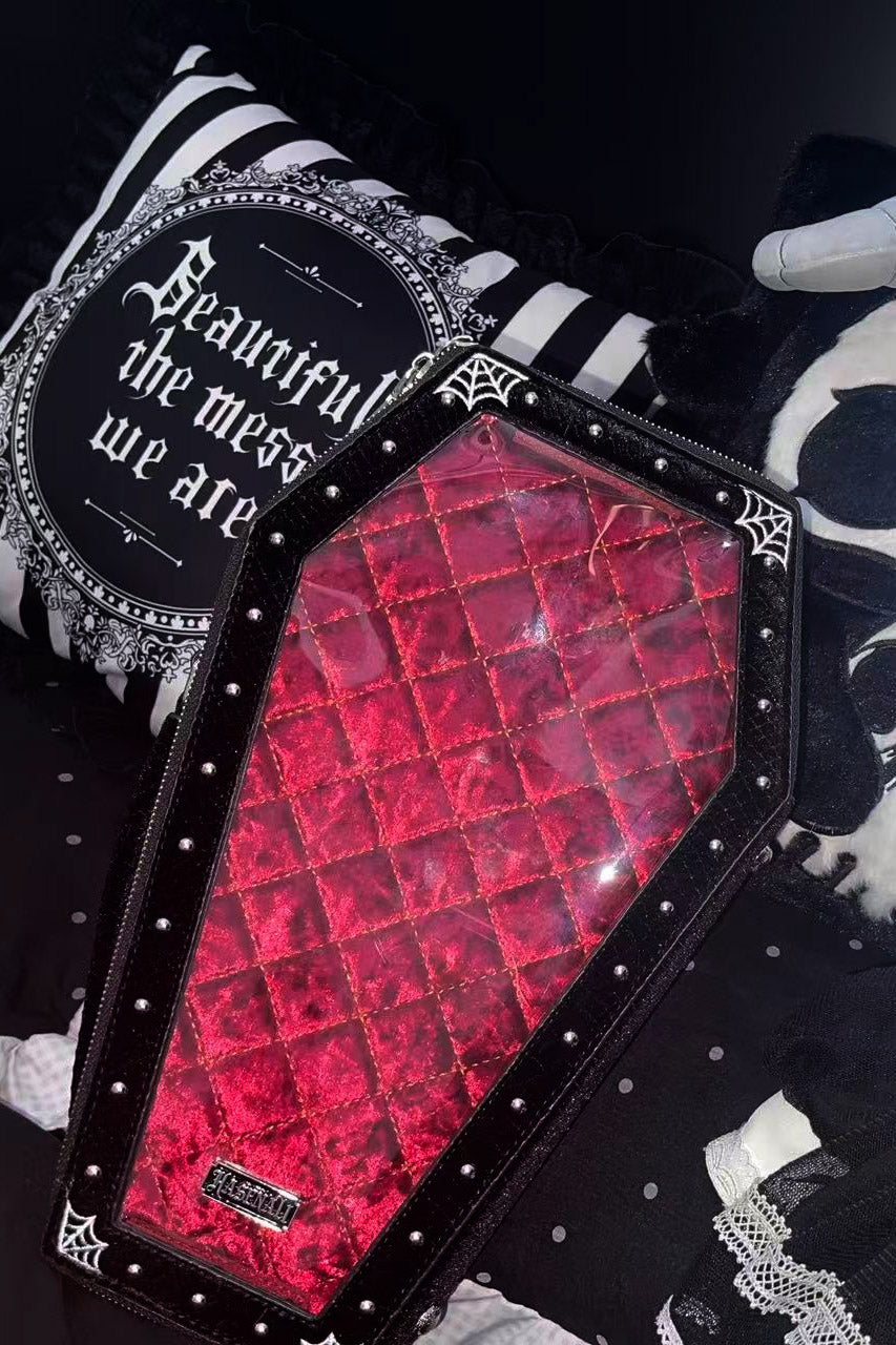 black and red studded rockabilly coffin backpack