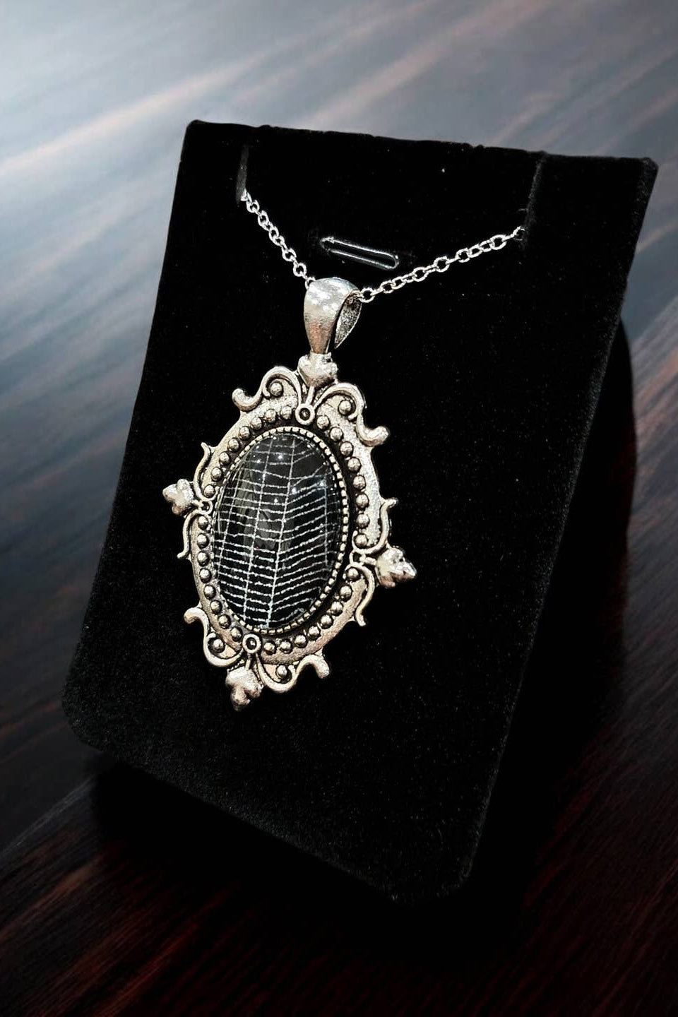 real genuine spiderweb necklace in a gothic frame 