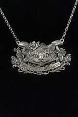 cheshire cat metal necklace